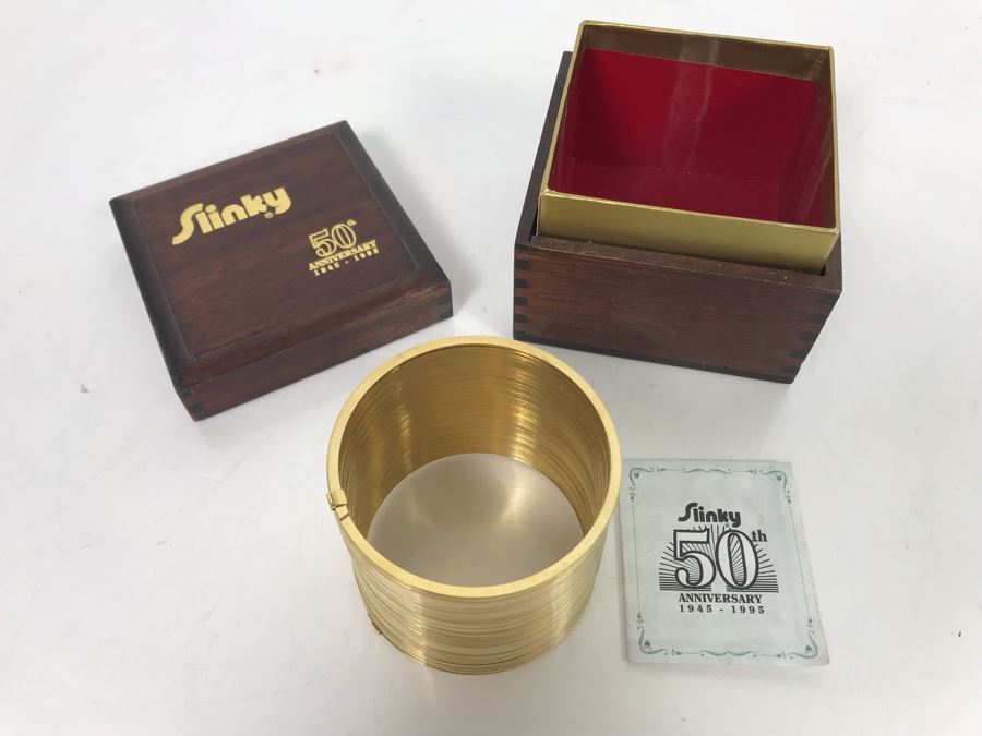 Gold Edition 50th Anniversary Slinky 1945-1995 With Wooden Box