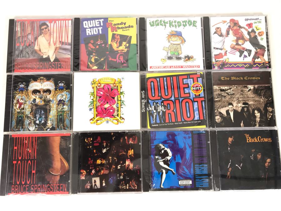(12) Sealed Music CDs: Michael Jackson, Quiet Riot, The Black Crowes, Guns N' Roses