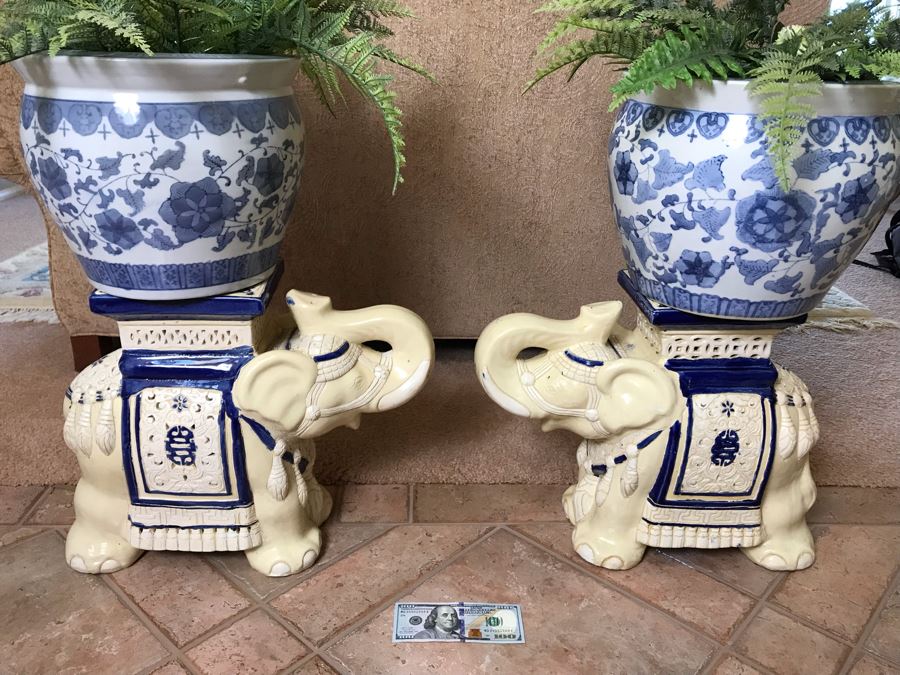 Pair Of Decorative Elephant Plant Stands With Pair Of Blue And White Plant Pots With Faux Ferns - FRE [Photo 1]