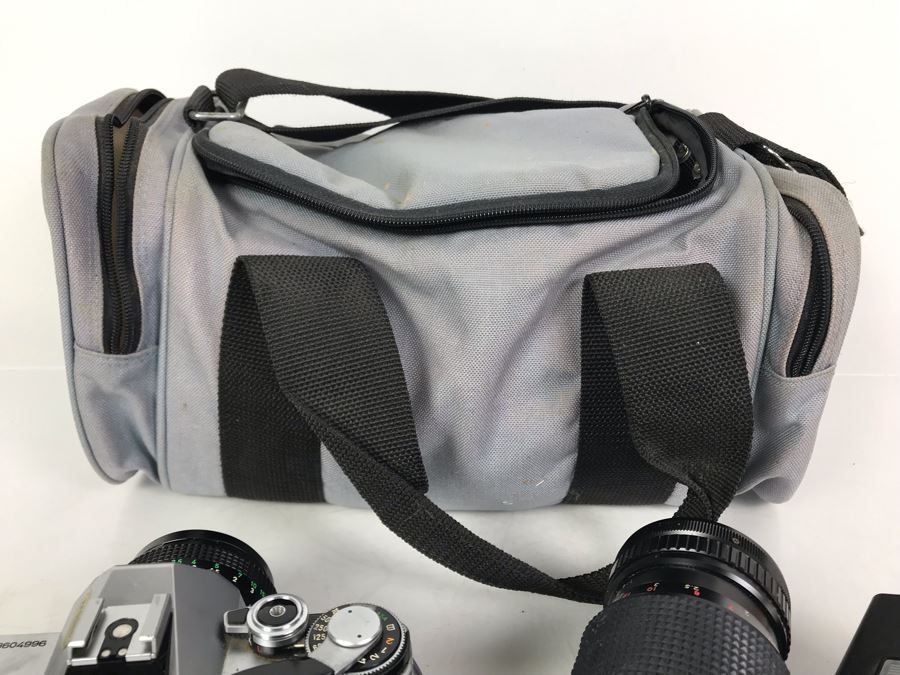 Canon AE-1 Camera With Pair Of Lenses, Flash And Camera Bag [Photo 11]