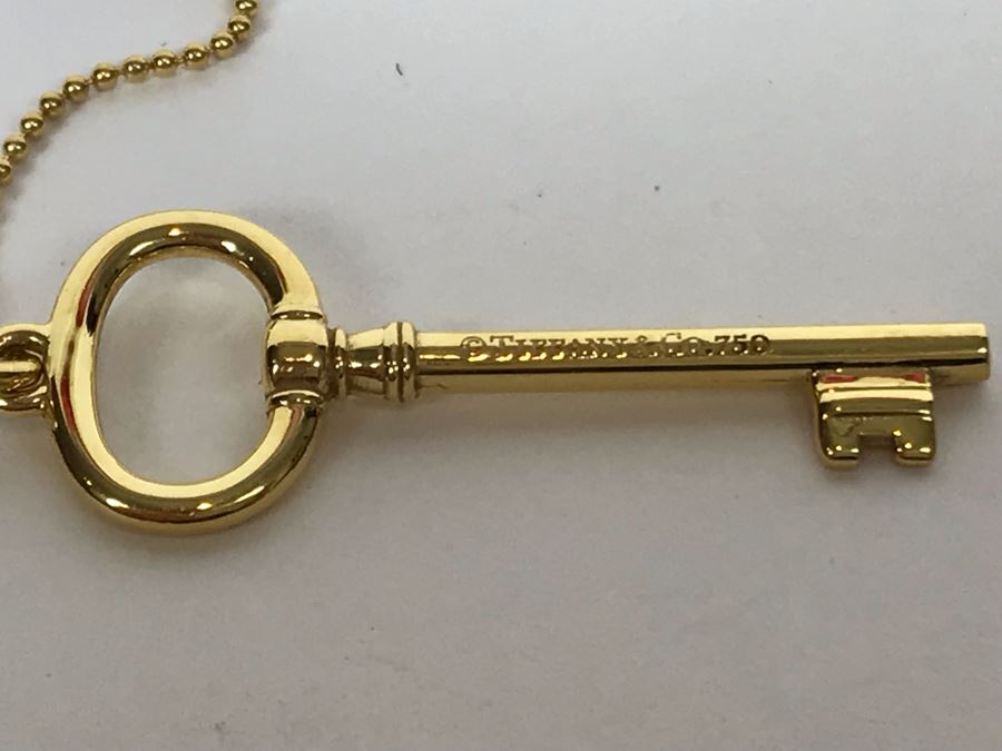 18K Gold Tiffany & Co .750 Key Pendant With 18K Gold Tiffany & Co. Necklace 5.4g Estimate $2,500 [Photo 3]