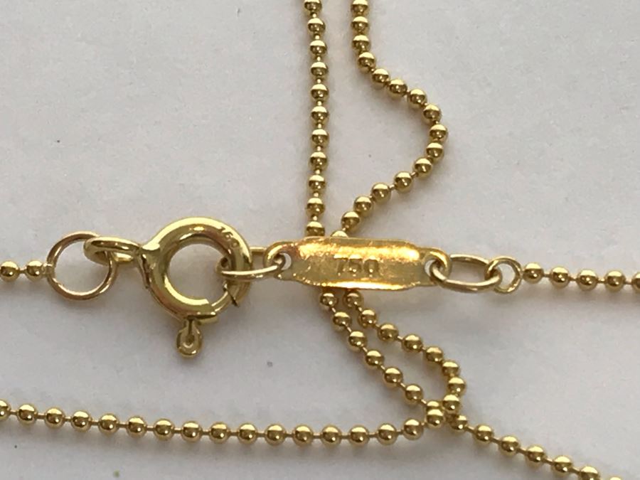 18K Gold Tiffany & Co .750 Key Pendant With 18K Gold Tiffany & Co. Necklace 5.4g Estimate $2,500 [Photo 9]