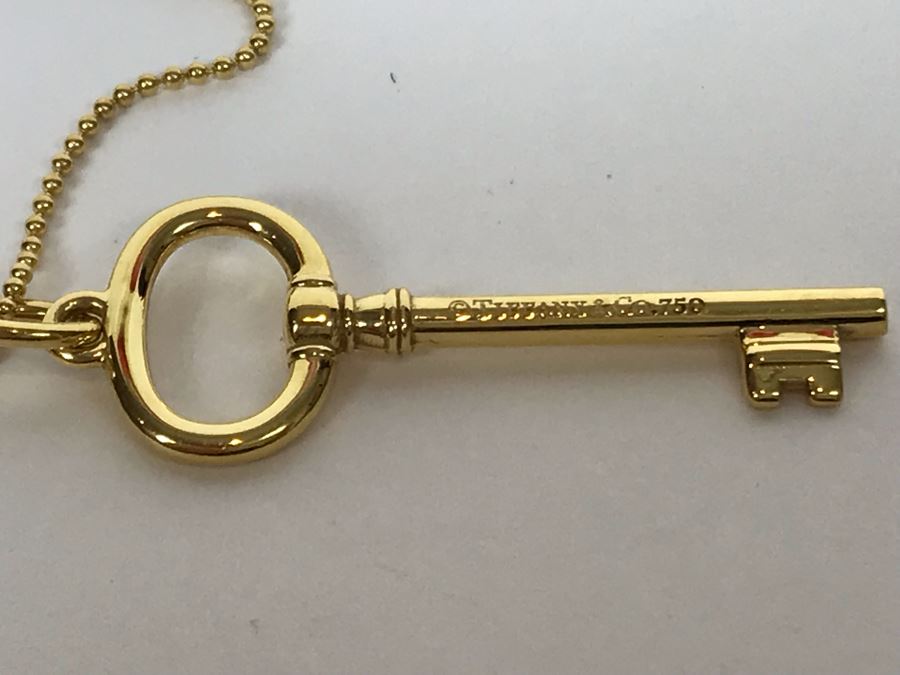18K Gold Tiffany & Co .750 Key Pendant With 18K Gold Tiffany & Co. Necklace 5.4g Estimate $2,500 [Photo 4]