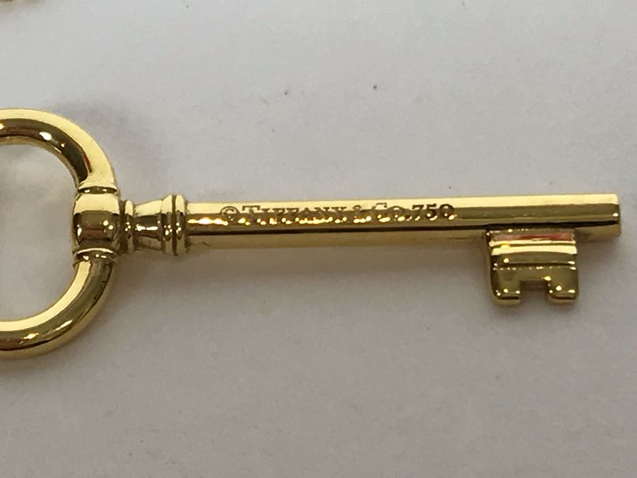 18K Gold Tiffany & Co .750 Key Pendant With 18K Gold Tiffany & Co. Necklace 5.4g Estimate $2,500 [Photo 5]