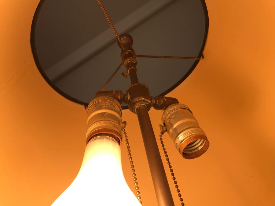 Vintage Brass Freestanding Floor Lamp With Claw Feet And Round Wooden Table [Photo 8]