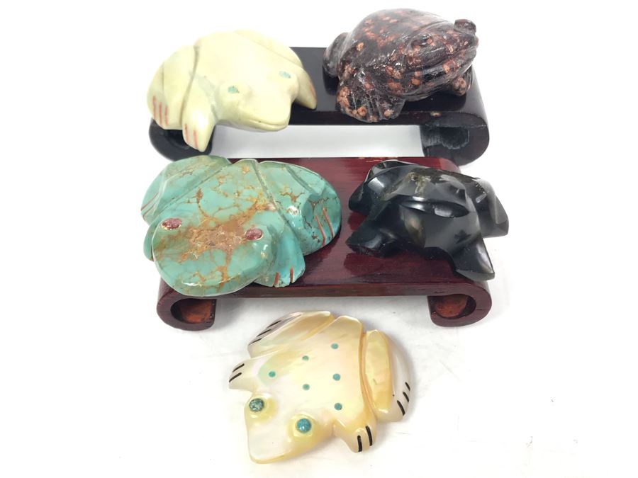 Collection Of (4) Hand Carved Various Stone Frogs, (1) Mother Of Pearl Carved Frog And (2) Wooden Stands [Photo 1]