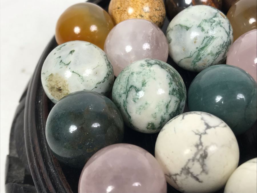 Collection Of Various Polished Stone Marbles With Wooden Stand