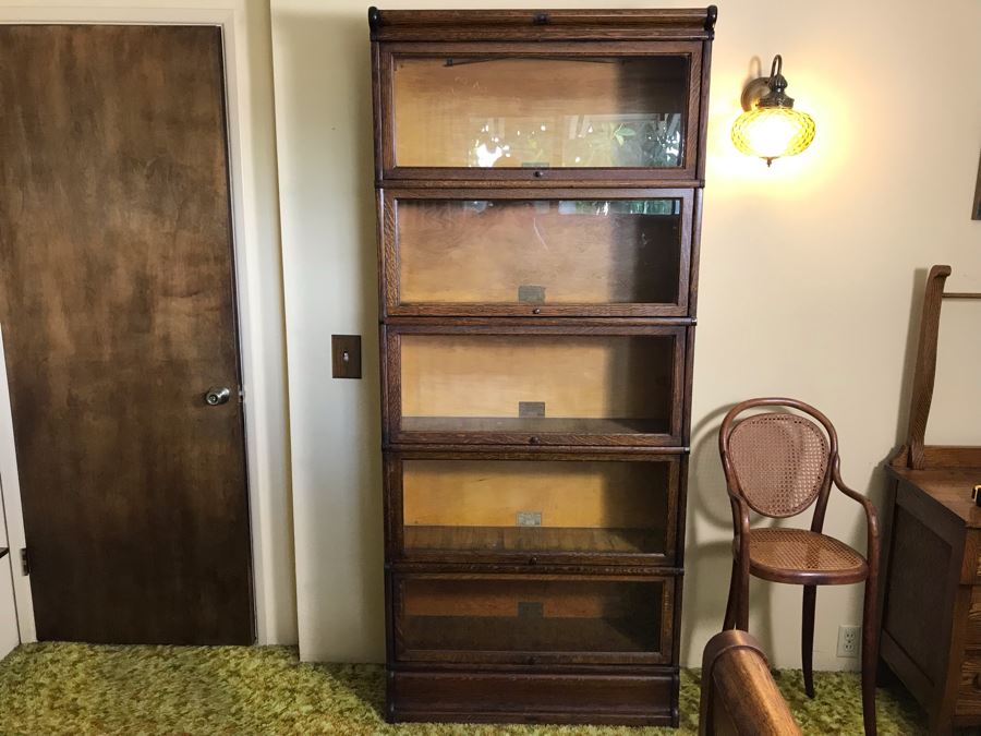 Striking Globe Wernicke Antique Tiger Oak Sectional Bookcase With (5) Bookcases, Base And Top 34W X 12D X 79H (Photo Shows Front / Side View) [Photo 2]