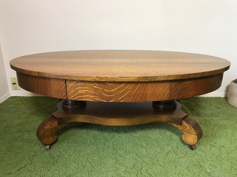 Vintage Tiger Oak Oval Coffee Table With Long Drawer And Casters 44W X 27D X 16.5H [Photo 1]