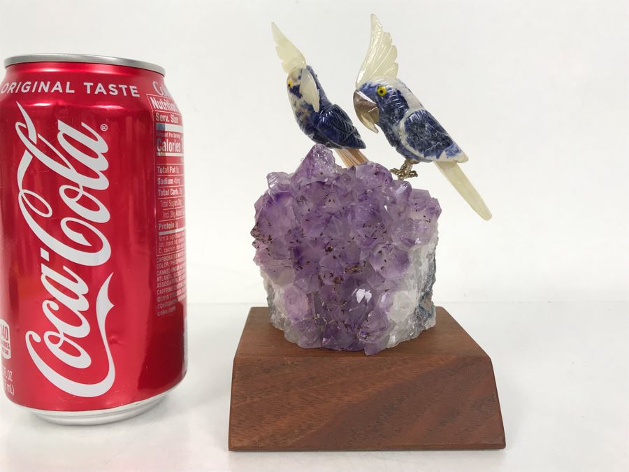 Pair Of Birds Figurines Hand-Carved In Semi-Precious Stones On Amethyst Geode With Wooden Stand 3.5 X 3.5 X 5.5H