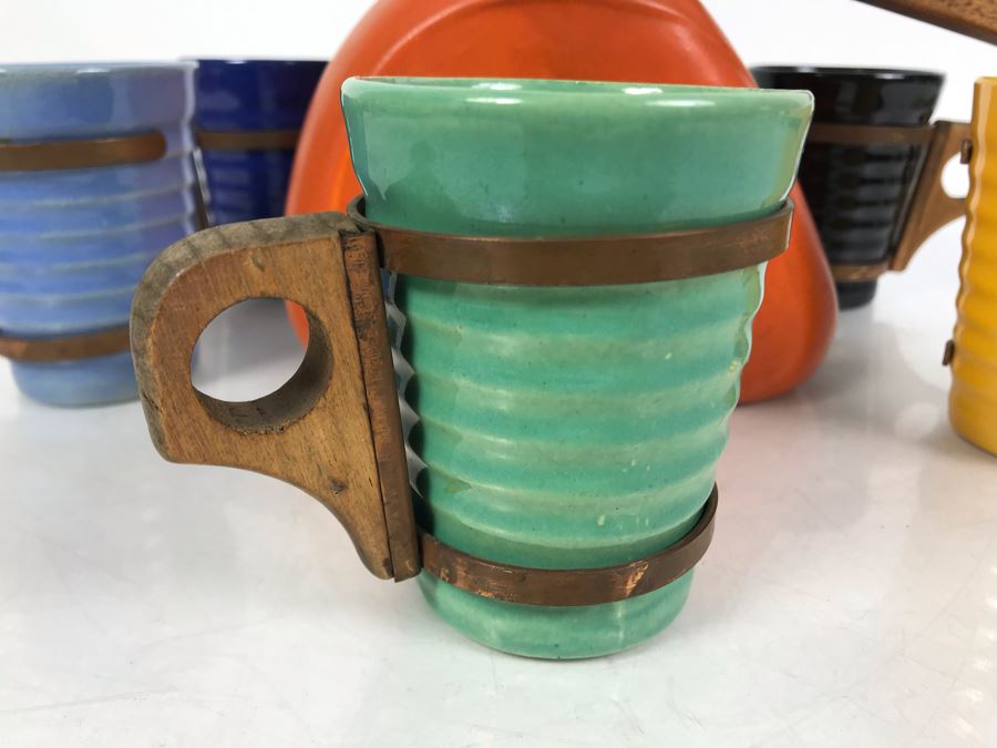 Mid-Century Modern Orange Pitcher 6.5H And Set Of (5) Colored Cups 3.5H All With Wooden And Copper Handles Unsigned Believed To Be Pacific California Pottery [Photo 4]