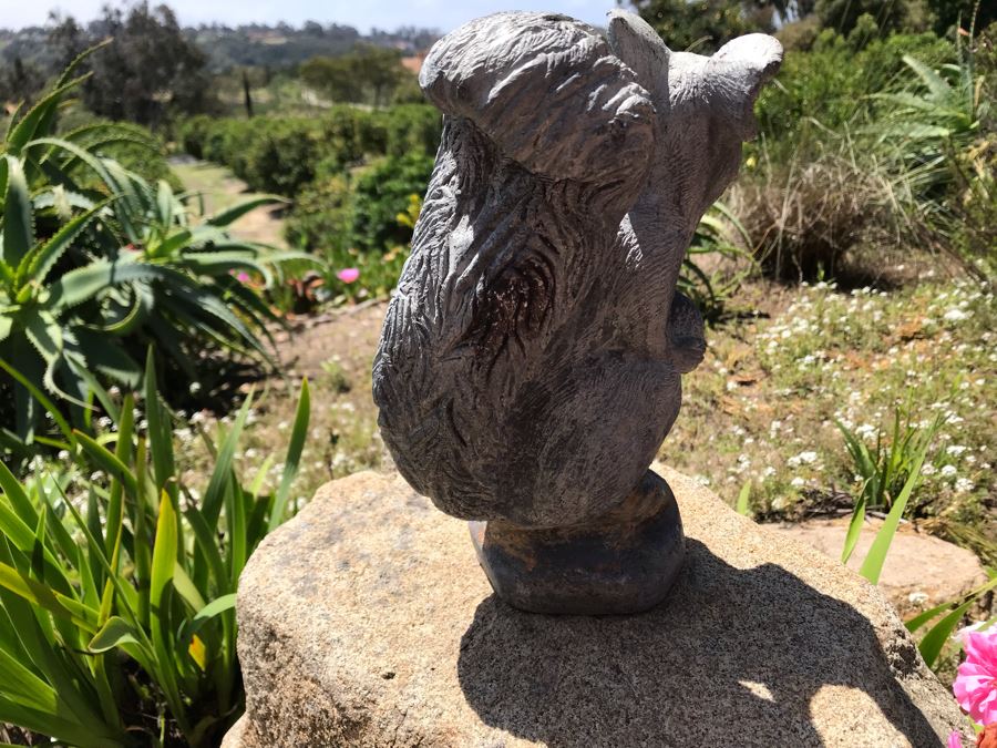 cement squirrel statue