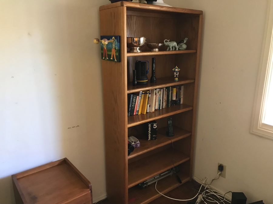 Oak Bookshelf With All Items On Shelves - See Photos For Items Incl Silverplate Bowls, Figurines, Weights, Tripods, Golf Coat Rack, Flashlights, Hats 36W X 12.5D X 71H [Photo 1]