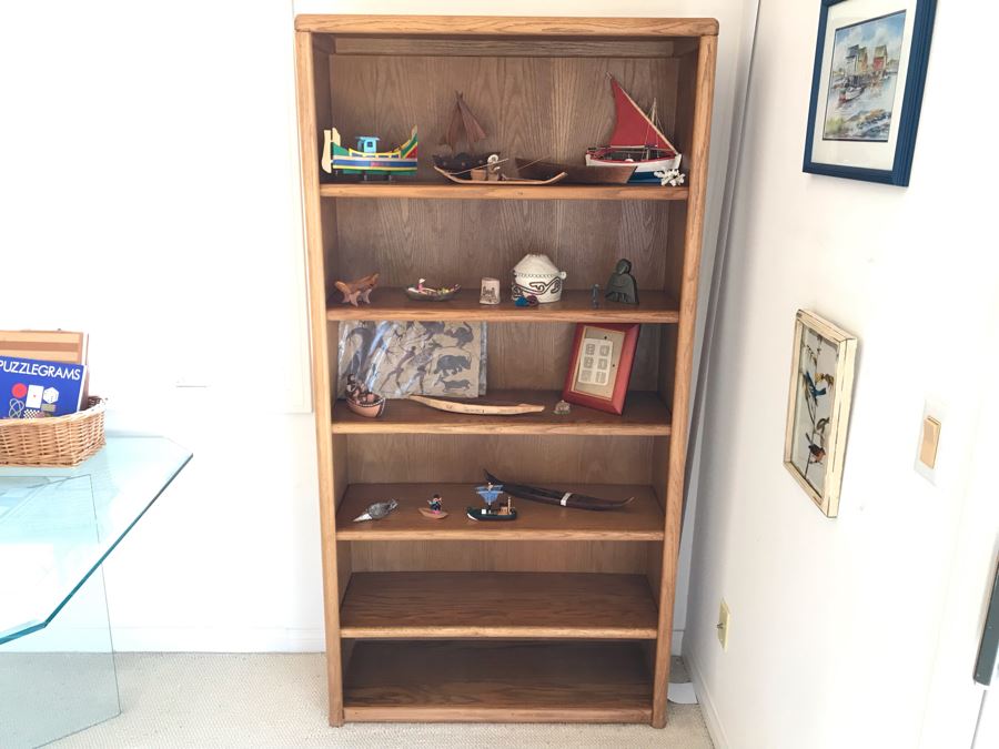 JUST ADDED - Oak Bookshelf With Various Ethnic Figurines And Artwork 36W X 13D X 70.5H - See Photos [Photo 1]