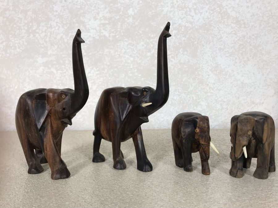 Four Carved Wooden Elephants Family Sculptures