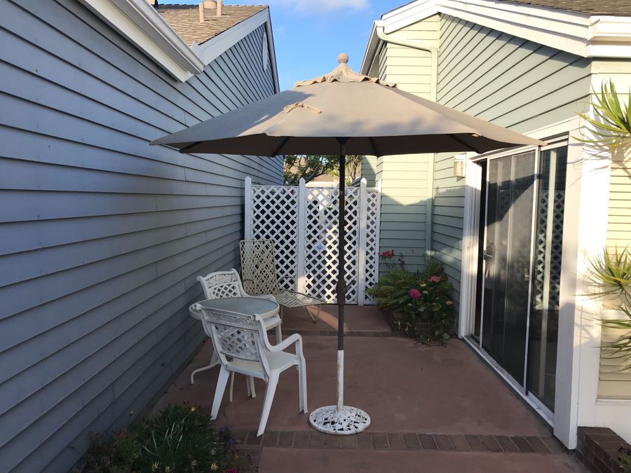 Outdoor Crank Umbrella With Cast Iron Base [Photo 1]