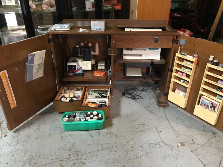 Mega Sewing Lot: Includes Husqvarna Viking Scandinavia 200 Sewing Machine Made In Sweden, Husqvarna Huskylock 560 Sewing Machine, Tons Of Sewing Supplies And Wooden Sewing Cabinet With Motorized Lift 46W X 20D X 32H - See Photos [Photo 3]
