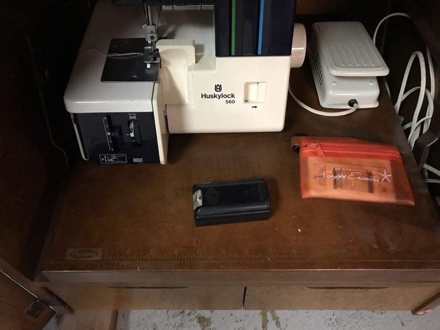 Mega Sewing Lot: Includes Husqvarna Viking Scandinavia 200 Sewing Machine Made In Sweden, Husqvarna Huskylock 560 Sewing Machine, Tons Of Sewing Supplies And Wooden Sewing Cabinet With Motorized Lift 46W X 20D X 32H - See Photos [Photo 27]