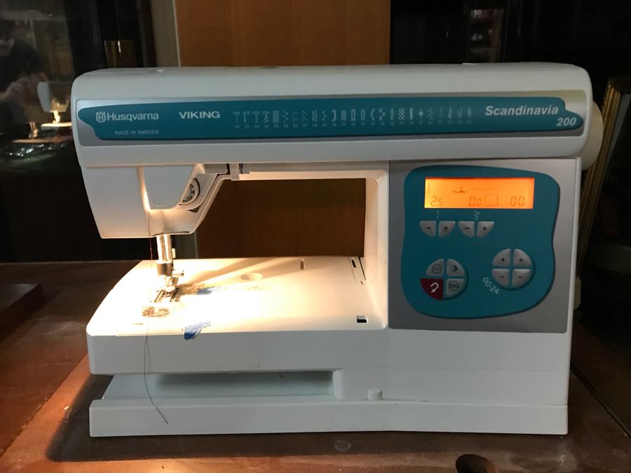 Mega Sewing Lot: Includes Husqvarna Viking Scandinavia 200 Sewing Machine Made In Sweden, Husqvarna Huskylock 560 Sewing Machine, Tons Of Sewing Supplies And Wooden Sewing Cabinet With Motorized Lift 46W X 20D X 32H - See Photos [Photo 5]