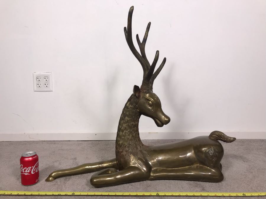 large brass deer statues