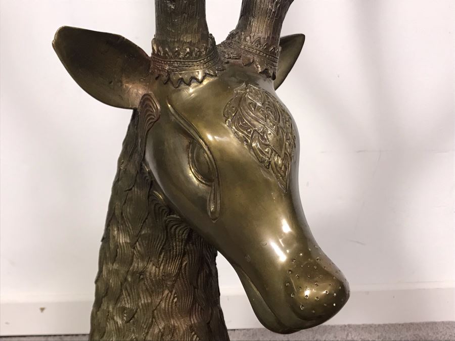 large brass deer statues
