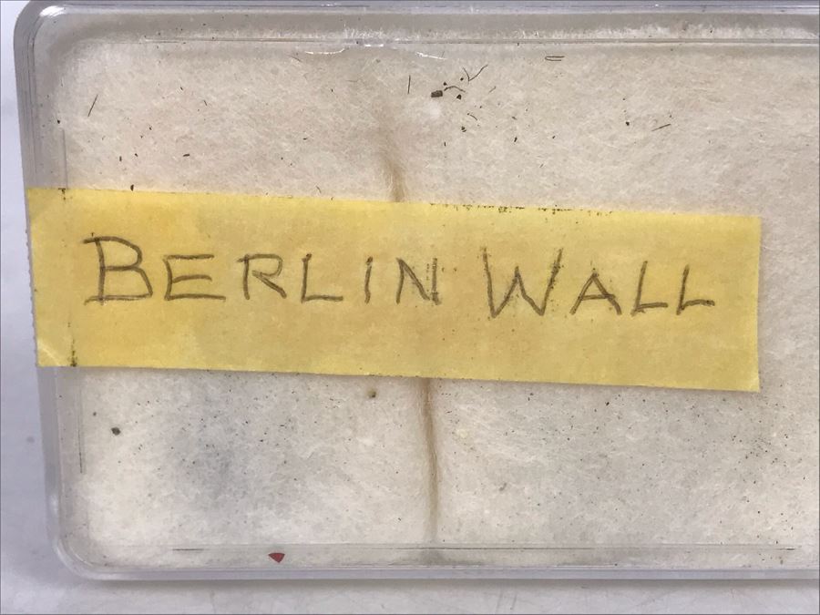 Pieces Of The Berlin Wall In Germany With Graffiti Paint Remaining On Rocks [Photo 6]