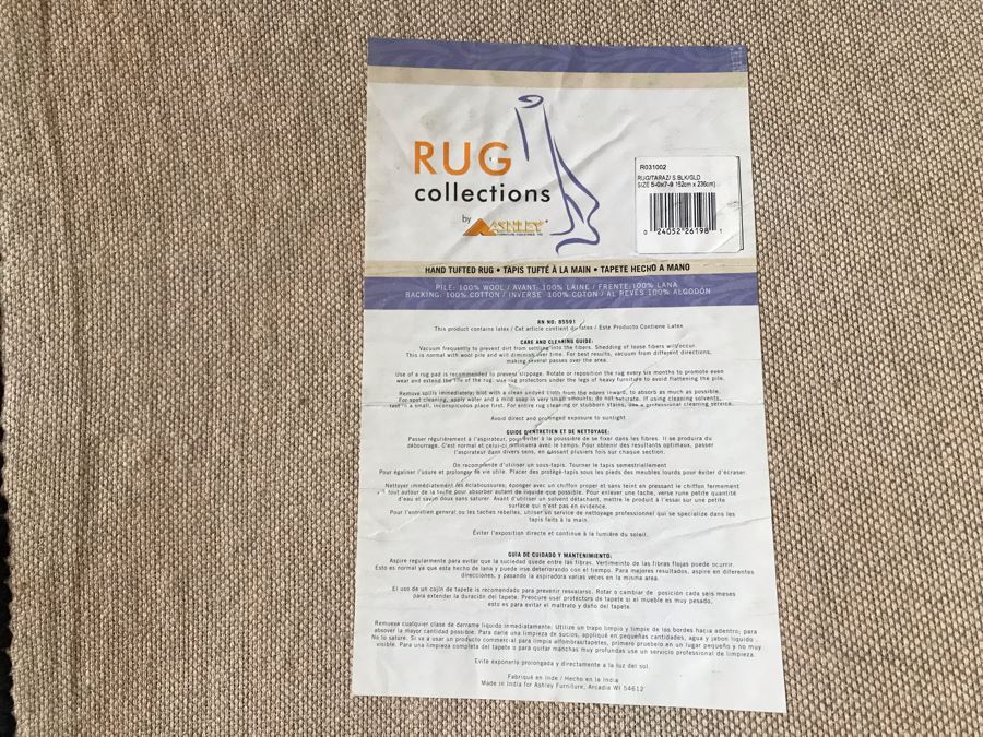 Ashley Furniture 100% Wool Pile Area Rug 5' X 7'9' [Photo 6]