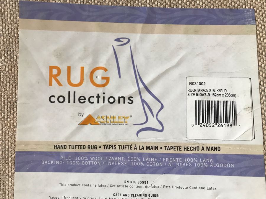 Ashley Furniture 100% Wool Pile Area Rug 5' X 7'9' [Photo 7]