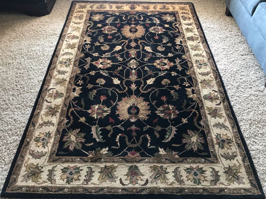 Ashley Furniture 100% Wool Pile Area Rug 5' X 7'9' [Photo 1]