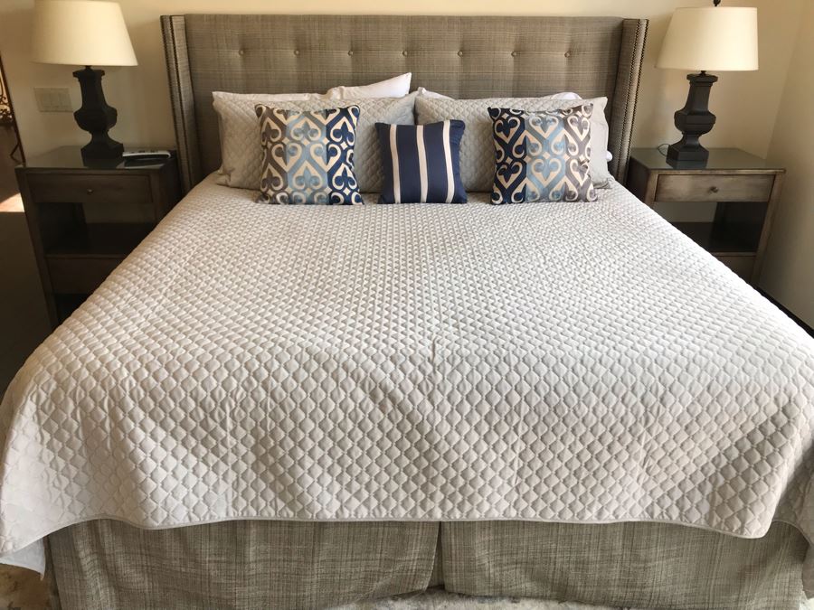 King Size Bed With Upholstered Tufted Headboard With Brass Nailhead Trim, Throw Pillows And Bedding Including Bed Skirt Includes Like New Sealy Mattress And Boxspring (Was Guest Bed For Grown Twin Kids - Rarely Used) [Photo 1]