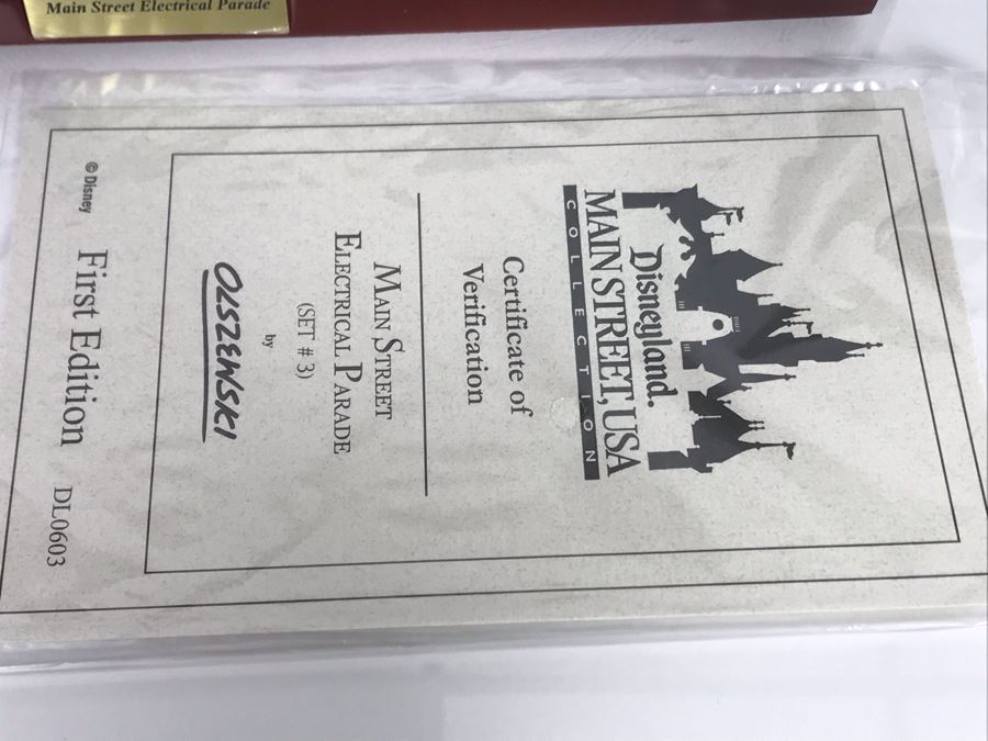 HAND SIGNED By Robert Olszewski Disneyland Main Street, USA Collection: First Edition Main Street Electrical Parade (Set #3) By Robert Olszewski Disney Theme Park Attraction Miniature Model With Box And COA 12W X 2.75D X 3H DL0603 (Estimate $300-$700) [Photo 9]
