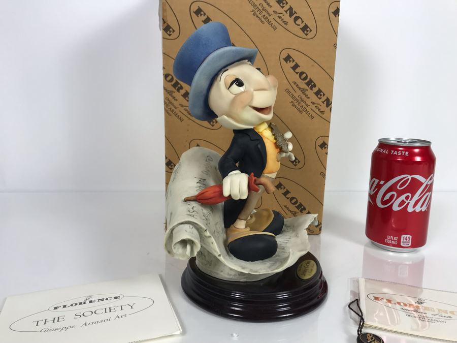 antique jiminy cricket figurine