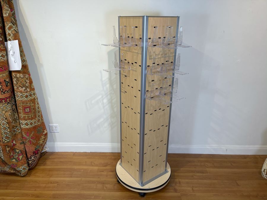 Rotating Store Display Fixture On Casters With Several Boxes Of Acrylic Product Holders 66'H X 29'D [Photo 2]