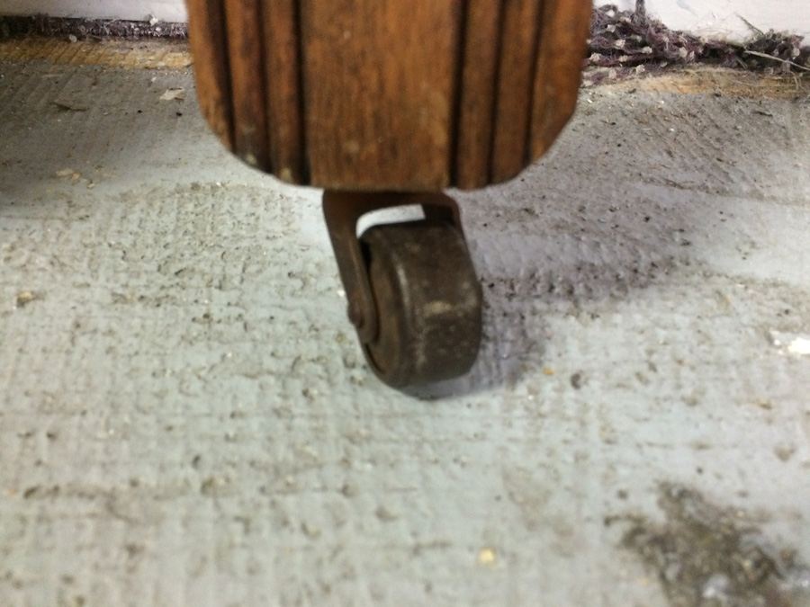 Vintage Child's Wooden Carved Bed on Metal Casters [Photo 3]