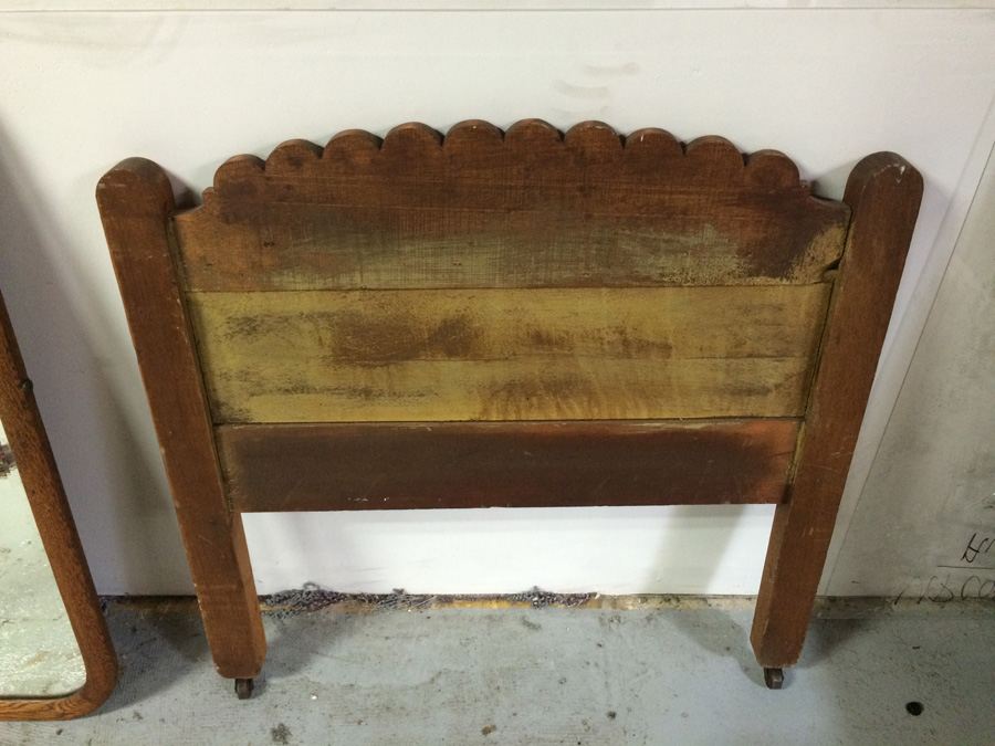 Vintage Child's Wooden Carved Bed on Metal Casters [Photo 5]