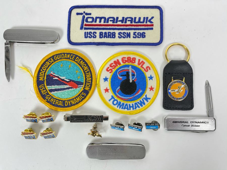General Dynamics Collectibles Lot Including Tomahawk Patches, General Dynamics Convair Division Pocket Knives And Various Pins Including Atlas Rocket 25