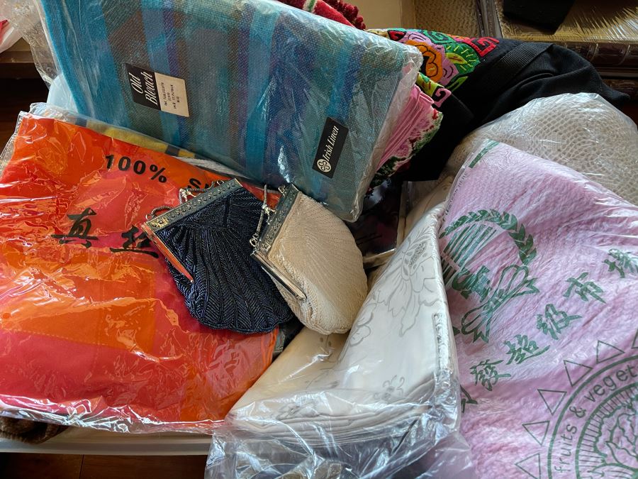 Plastic Bin Filled With New Linens, Beaded Purses, Tablecloths ...