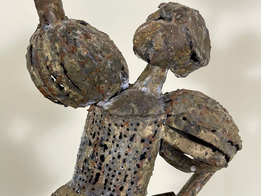 Metal Sculpture Of Woman Holding Up Ball On Wooden Base [Photo 14]