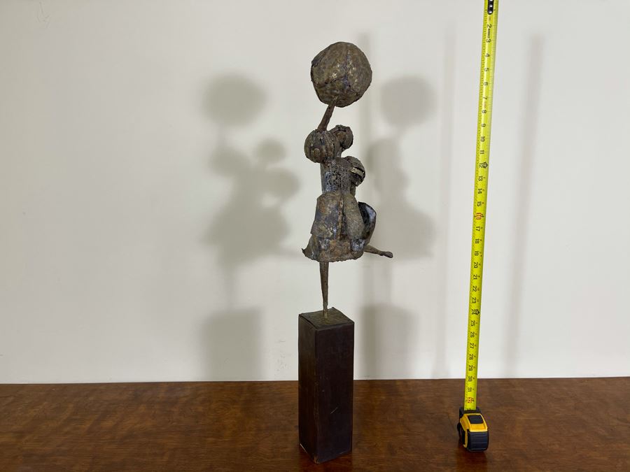 Metal Sculpture Of Woman Holding Up Ball On Wooden Base [Photo 10]
