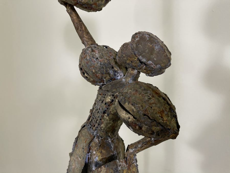 Metal Sculpture Of Woman Holding Up Ball On Wooden Base [Photo 5]