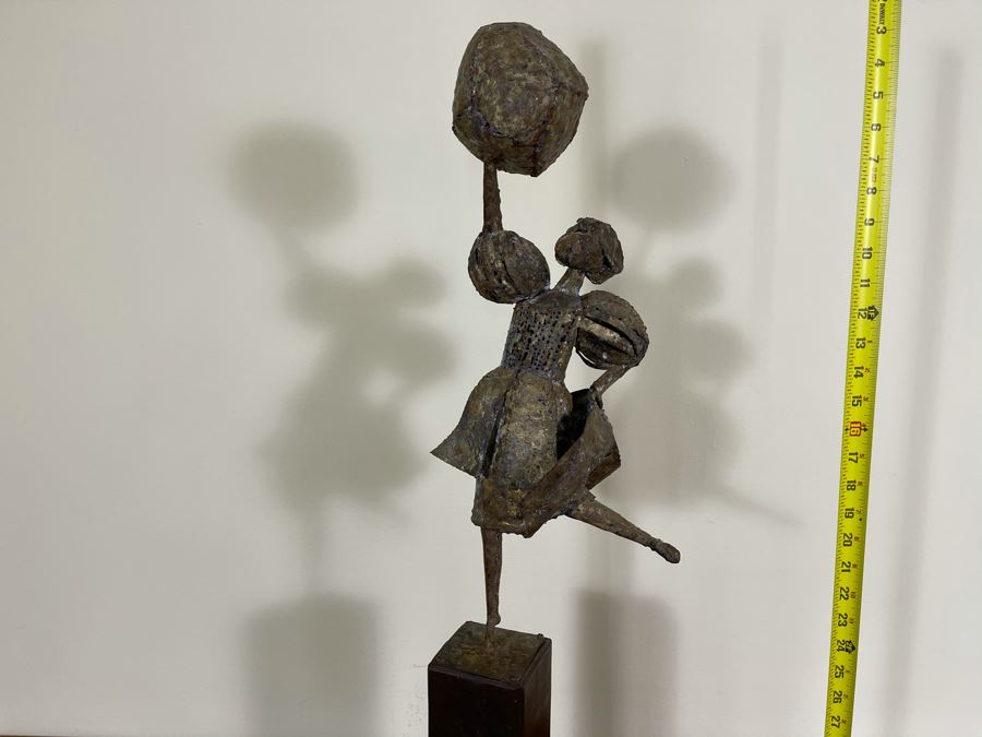 Metal Sculpture Of Woman Holding Up Ball On Wooden Base [Photo 11]