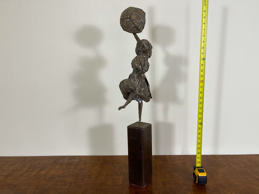 Metal Sculpture Of Woman Holding Up Ball On Wooden Base [Photo 8]