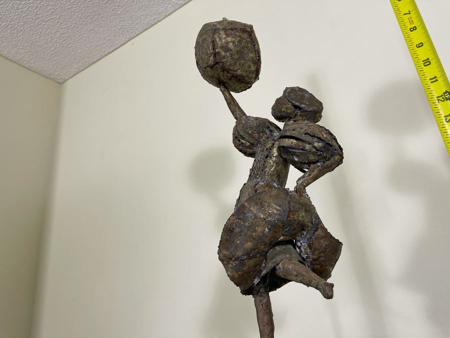 Metal Sculpture Of Woman Holding Up Ball On Wooden Base [Photo 4]
