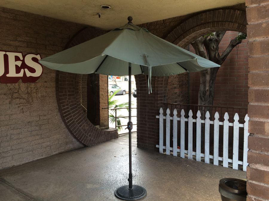 Large Outdoor Canvas Umbrella with Metal Umbrella Stand Sunbrella [Photo 1]