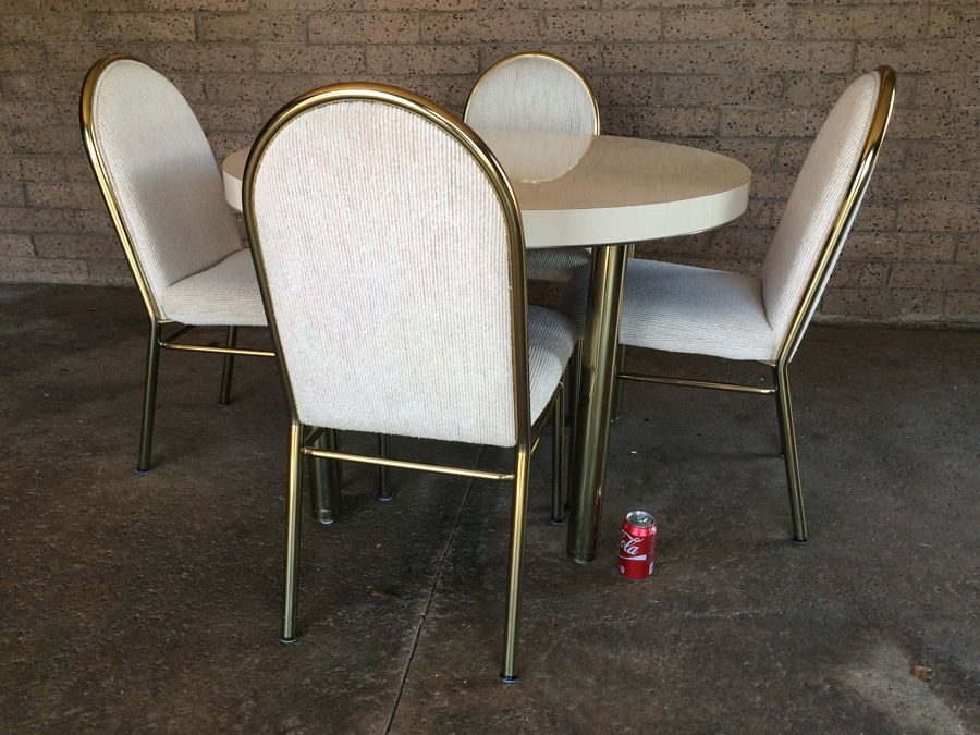 Round White Dining Table with 4 Chairs and Brass Accents [Photo 1]