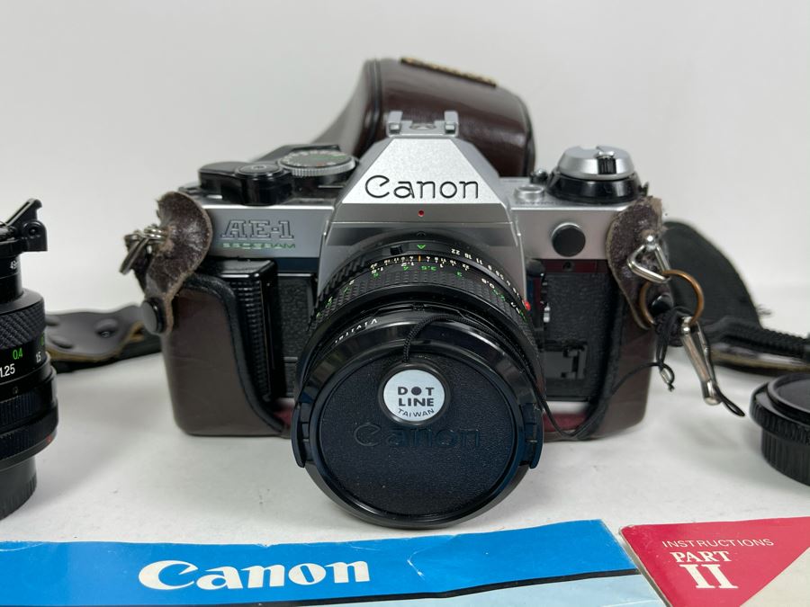 Vintage Canon AE-1 Film Camera With Additional Lens And Manuals [Photo 2]