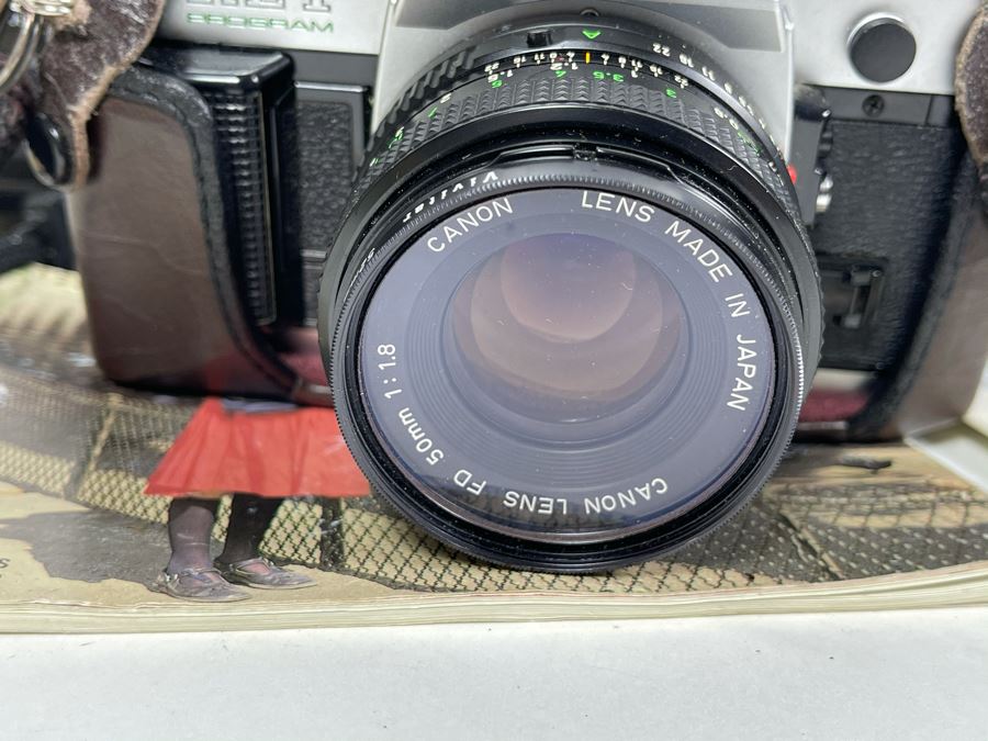 Vintage Canon AE-1 Film Camera With Additional Lens And Manuals [Photo 10]