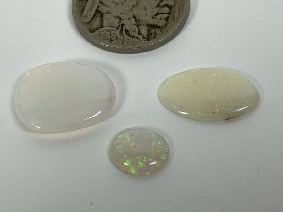 JUST ADDED - Set Of Three Good Quality Opal Gemstones 9cts Total Weight