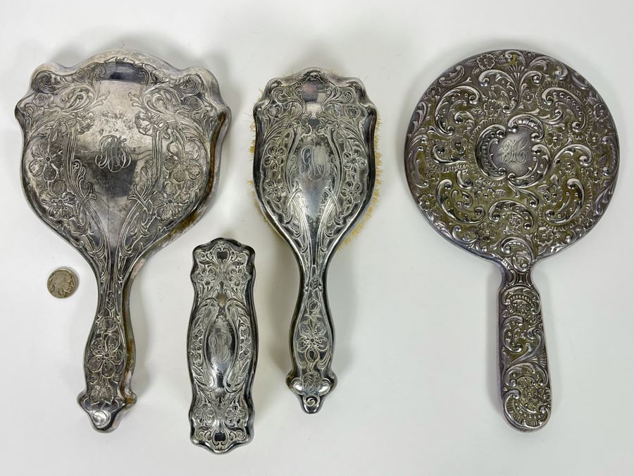 Vintage Chased Silverplate Vanity Set With Handheld Mirror And Pair Of Brushes And Vintage Repousse Silverplate Handheld Vanity Mirror [Photo 1]