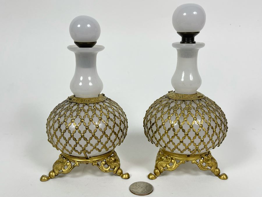 Pair Of Vintage Footed Milk Glass Perfume Bottles With Gilt Metal Overlay 6.5H And 7.5H [Photo 2]